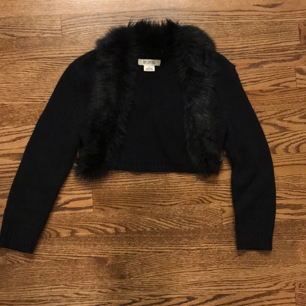 Michael Kors shrug